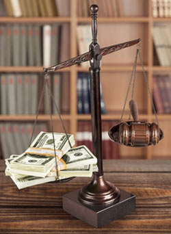 Money Claim scales of justice with money