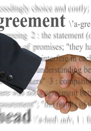 Agreement Done shaking hands over agreement