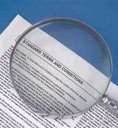 magnifying glass on document