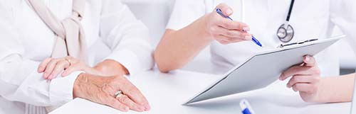 elderly lady with health worker