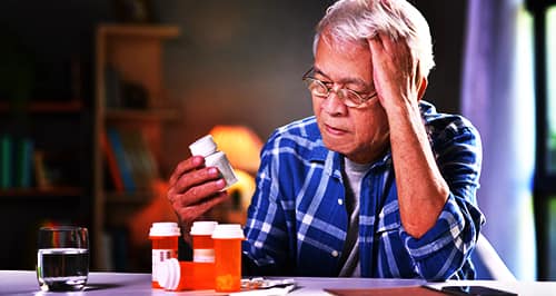 old man money with medication